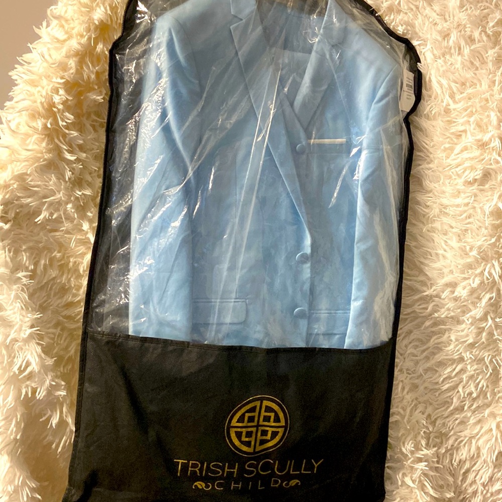 Brand new light blue suit for a young man. Jacket, vest and pants m.